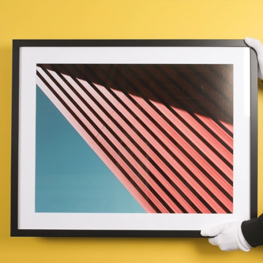 Framed Fine Art print on a yellow wall