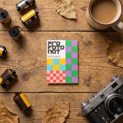Cadeaukaart naast fotoproducten