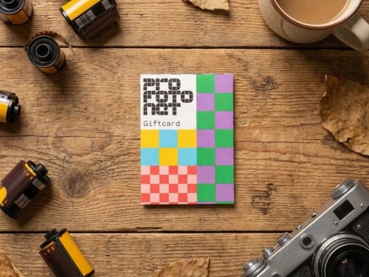 Cadeaukaart naast fotoproducten