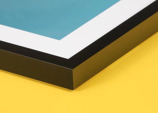 Side view of a framed Fine Art print with a mount